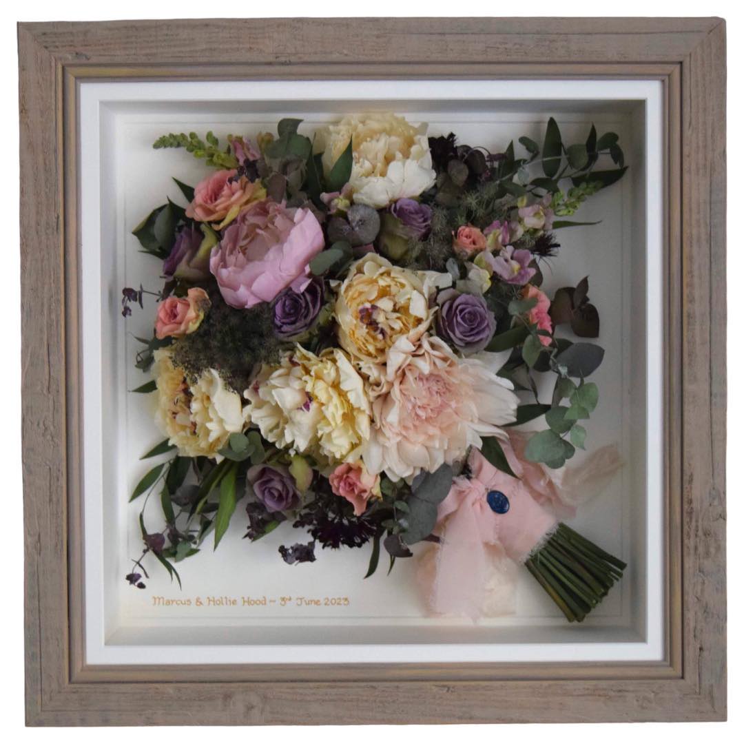 Natural hand tied preserved bridal bouquet in rustic wooden frame
