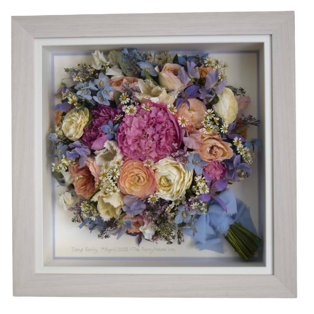 framed and preserved pretty bridal bouquet