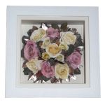 Bridal posy of pink and ivory roses with rose gold leaves preserved and displayed in a white box frame