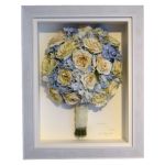 Hand tied preserved bridal bouquet of white roses and blue hydrangea in a white box frame