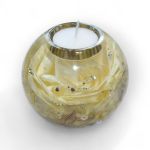 Flower preservation of a white rose embedded in a resin round tealight holder